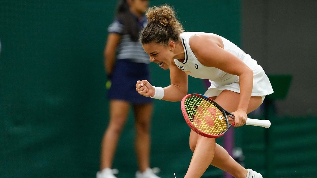 (AP Photo/Kirsty Wigglesworth) : Jasmine Paolini of Italy reacts during her fourth round match against Madison Keys of the United States at the Wimbledon tennis championships in London, Sunday, July 7, 2024.
